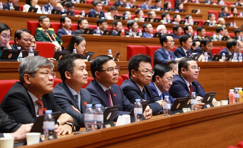 Đoàn đại biểu Đảng bộ Chính phủ dự phiên thảo luận tại hội trường về các văn kiện Đại hội, sáng 21/1. Ảnh: TTXVN